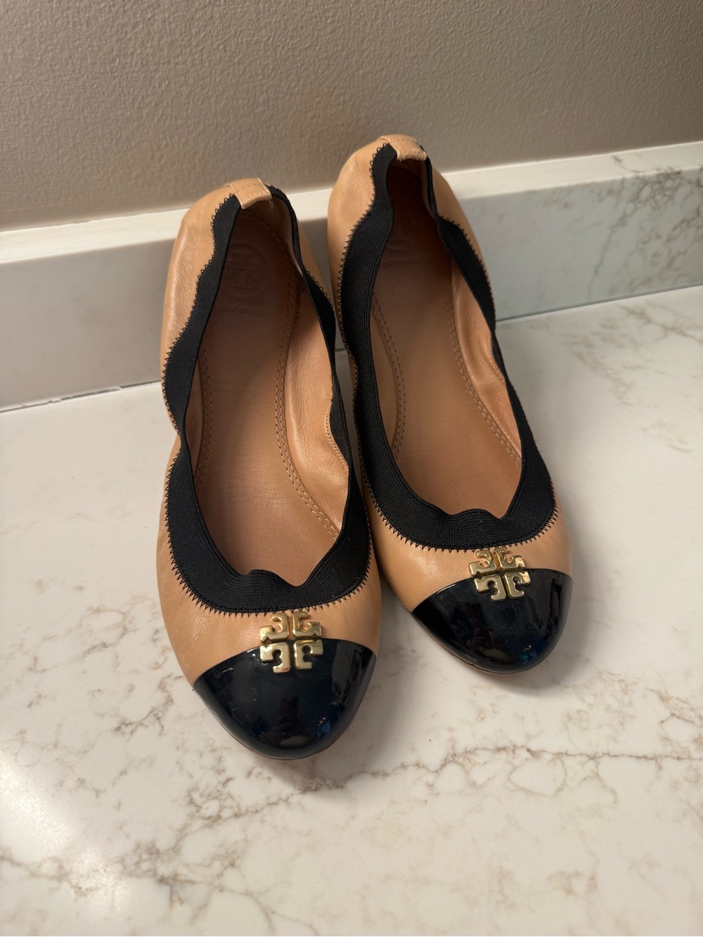 Tory Burch Tan Leather Ballet Flats with Black Patent Cap Toe and Gold Logo
